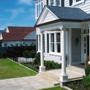 view of the entrance and pathway using tuscanmoire cottage, estate, facade, home, house, outdoor structure, porch, property, real estate, residential area, siding, structure, walkway, window