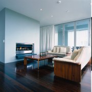 View of a living area, wooden flooring and ceiling, floor, flooring, furniture, hardwood, interior design, living room, real estate, room, table, wood, wood flooring, gray, black