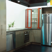 view of the kitchen  showing Westinghouse's stainless countertop, home appliance, kitchen, major appliance, property, real estate, refrigerator, gray, black, white