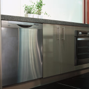 view of the Westinghouse stainless steel dishwasher and cabinetry, countertop, glass, kitchen, black, white