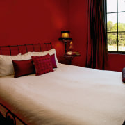 view of the bedroom painted in resene persian bed, bed frame, bed sheet, bedroom, furniture, home, interior design, room, suite, red