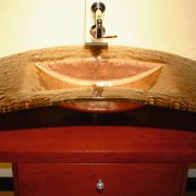 View of a coloured glass curved basin, red ceiling, ceiling fixture, lamp, lampshade, light fixture, lighting, lighting accessory, wood, red, orange