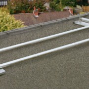 Flat roof top with folded down guard rail automotive exterior, gray