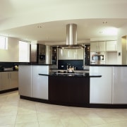 A view of a kitchen, cream tiled floor, cabinetry, countertop, cuisine classique, floor, flooring, interior design, kitchen, real estate, room, gray, white