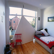 view of this bedroom showing polished timber flooring architecture, bedroom, ceiling, daylighting, floor, flooring, hardwood, home, house, interior design, laminate flooring, living room, loft, property, real estate, room, wall, window, wood, wood flooring, gray