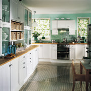 A view of a kitchen, stainless steel flooring, cabinetry, countertop, cuisine classique, home, interior design, kitchen, room, window, white, gray