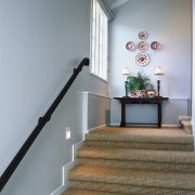 Stairway with sisal carpet, white walls and hall floor, flooring, handrail, home, interior design, stairs, wall, gray