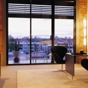 A view of a study area, crea carpet apartment, interior design, room, window, black, orange