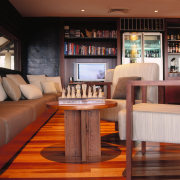 view of the bar area where the ceiling furniture, interior design, table, brown, red