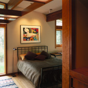 A view of a bedroom, wooden flooring, spotlights, bedroom, ceiling, furniture, home, house, interior design, real estate, room, window, black, brown