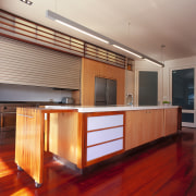 A view of a kitchen area, wooden flooring cabinetry, ceiling, countertop, floor, flooring, hardwood, interior design, kitchen, laminate flooring, real estate, wood, wood flooring, red, gray