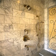 view of the shower showing traditional stainles and bathroom, floor, flooring, room, tile, wall, orange