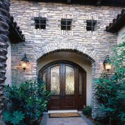 view of this timber arch front door designed arch, architecture, building, cottage, courtyard, estate, facade, home, house, mansion, outdoor structure, property, real estate, residential area, roof, window, black