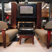view of this warmington fireplace  that creates chair, flooring, furniture, interior design, living room, table, wood, black