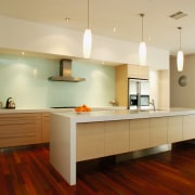 Kitchen with light coloured veneer cabinetry, cream benchtops cabinetry, ceiling, countertop, cuisine classique, floor, flooring, hardwood, interior design, kitchen, laminate flooring, real estate, room, wood flooring, orange