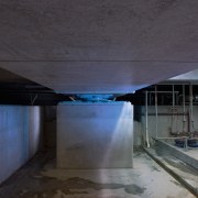 View of earthquake protection system at base of architecture, ceiling, daylighting, infrastructure, light, sky, structure, subway, black, gray