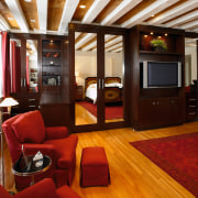 view of the custom wall unit  that ceiling, flooring, hardwood, interior design, living room, room, suite, wood flooring, red, brown