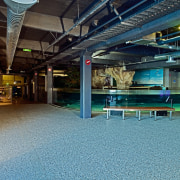 Large open plan area at Kelly Tarlton's with floor, leisure centre, structure, teal