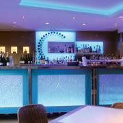 View of bar with blue and patterned glass bar, blue, display device, function hall, interior design, lighting, purple, restaurant, blue, teal