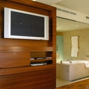 Hotel suite with built in timber veneer television cabinetry, floor, flooring, interior design, wood, brown