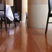 Wide timber flooring boards in restaurant dining room. chair, floor, flooring, furniture, hardwood, home, interior design, laminate flooring, living room, property, table, tile, wood, wood flooring, wood stain, brown