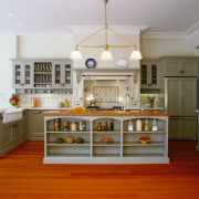 Traditional kitchen with cream cabinetry, timber island top cabinetry, countertop, cuisine classique, floor, flooring, furniture, hardwood, interior design, kitchen, room, brown, gray