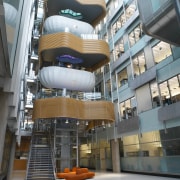 Interior view of large atrium area with stairway, architecture, building, commercial building, condominium, corporate headquarters, daylighting, facade, metropolitan area, mixed use, gray