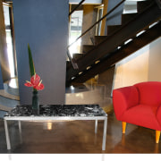 Office foyer area featuring stone and chrome coffee chair, floor, furniture, interior design, living room, loft, product design, table