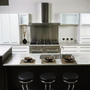 White and black kitchen with black bar stools, countertop, cuisine classique, furniture, home appliance, interior design, kitchen, kitchen appliance, kitchen stove, product design, small appliance, black, white