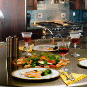 view of this kitchen featuring a cook-n-dine stainless brunch, countertop, cuisine, dish, food, kitchen, meal, table, black, brown