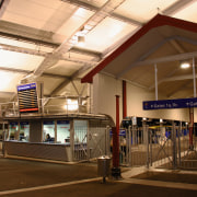 Interior and passage way to gates inside the airport terminal, metropolitan area, train station, transport, brown