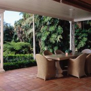 view of the outdoor dining area that was backyard, estate, furniture, home, house, outdoor structure, patio, plant, property, real estate, table, window, black, gray