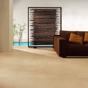 A view of a living are with a floor, flooring, furniture, hardwood, interior design, laminate flooring, living room, tile, wood, wood flooring, orange, white