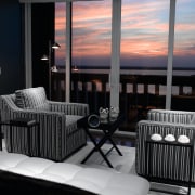 view of the relaxing area, with usoe of chair, furniture, home, interior design, room, window, black, gray
