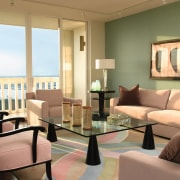 view of the living area featuring chairs the furniture, home, interior design, living room, real estate, room, window, window covering, orange, brown