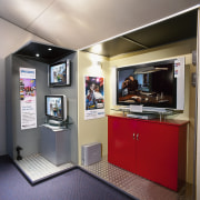 this booth showcases the phillips home theatre in display device, interior design, multimedia, gray