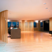 A view of the reception area, cream walls, apartment, ceiling, floor, flooring, hardwood, interior design, lobby, real estate, room, wood, brown, orange