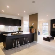 view of the kitchen area in this house countertop, cuisine classique, floor, flooring, interior design, kitchen, living room, property, real estate, room, gray, black