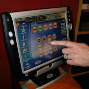 view of the crestron wireless touchscreen that can display device, electronic device, electronics, gadget, mobile device, multimedia, screen, tablet computer, technology, black, red