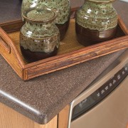 A close up view of the grey benchtop, furniture, product design, table, wood stain, brown