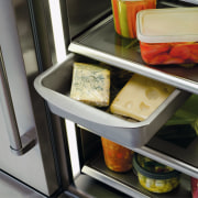 A view of the inside of the fridge. food, gray, black