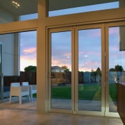 view of these bifold doors that open out door, glass, interior design, real estate, window, brown