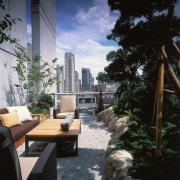 An exterior view of the patio area, many apartment, architecture, condominium, home, house, interior design, outdoor structure, patio, property, real estate, black