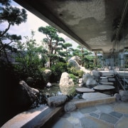 A view of the exterior area, many plants architecture, house, landscape, outdoor structure, plant, tree, water, black, gray