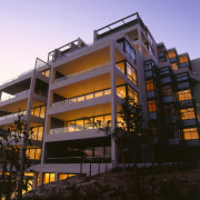 Exterior view of new apartment complex in Sydney apartment, architecture, building, commercial building, condominium, corporate headquarters, evening, facade, headquarters, home, house, mixed use, real estate, residential area, sky, black