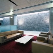 Aview of a seating area, grey tiled floor, architecture, ceiling, daylighting, floor, furniture, interior design, living room, table, wall, window, gray, black