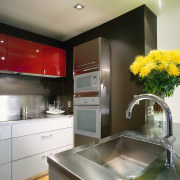 A view of a kitchen, grye and red cabinetry, countertop, interior design, kitchen, gray