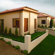 view of the home built in dryblock and estate, facade, home, house, property, real estate, residential area, villa, brown
