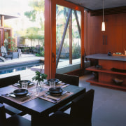 A view of a kitchen by David Hertz interior design, living room, real estate, table, window, red