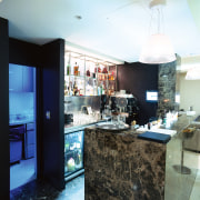 A view of the bar area and all countertop, interior design, kitchen, white, black